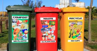 red yellow and green trash bins