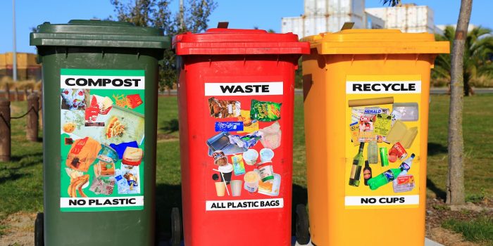 red yellow and green trash bins